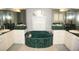 Large bathroom with and sinks, a luxurious soaking tub, and separate shower at 431 San Felix St, Punta Gorda, FL 33983