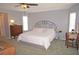 Main bedroom with king-size bed and ensuite bathroom access at 431 San Felix St, Punta Gorda, FL 33983