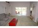 Living room with sliding doors leading to a patio and pool area at 431 San Felix St, Punta Gorda, FL 33983