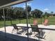 Enjoy the view from this screened patio with comfortable seating at 431 San Felix St, Punta Gorda, FL 33983