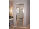 Spa-like bathroom with walk-in shower and green marble finishes at 431 San Felix St, Punta Gorda, FL 33983