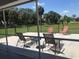 Enjoy the view from this screened patio with comfortable seating at 431 San Felix St, Punta Gorda, FL 33983