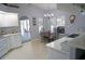 Kitchen with eat-in area, white cabinets, and view to backyard at 431 San Felix St, Punta Gorda, FL 33983
