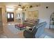 Spacious living room with gray couches and a wooden coffee table at 1307 Tidy Ln, Punta Gorda, FL 33983