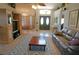Open living room with a view of the entryway and additional living space at 1307 Tidy Ln, Punta Gorda, FL 33983