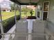 This screened porch offers a relaxing outdoor space at 1307 Tidy Ln, Punta Gorda, FL 33983