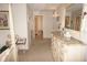 Bedroom with dresser and view of hallway at 1307 Tidy Ln, Punta Gorda, FL 33983