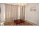 Bright dining room featuring a chandelier and large windows at 1307 Tidy Ln, Punta Gorda, FL 33983