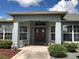 Front entrance with double doors and a covered porch at 1307 Tidy Ln, Punta Gorda, FL 33983