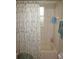 Bathroom with shower/tub combo and window at 1307 Tidy Ln, Punta Gorda, FL 33983