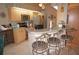 Modern kitchen featuring stainless steel appliances and a breakfast bar at 1307 Tidy Ln, Punta Gorda, FL 33983