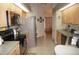 Well-equipped kitchen with stainless steel appliances and ample counter space at 1307 Tidy Ln, Punta Gorda, FL 33983