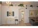 Light and bright hallway with access to bathroom and living areas at 1307 Tidy Ln, Punta Gorda, FL 33983
