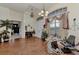 Living room with hardwood floors, exercise equipment, and access to other rooms at 8430 Acorn Blvd, Punta Gorda, FL 33982