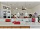 Kitchen with open counter, sink, and a view to the living room at 8430 Acorn Blvd, Punta Gorda, FL 33982