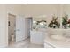 Bright bathroom boasts a corner vanity, separate toilet area, and an updated shower at 8430 Acorn Blvd, Punta Gorda, FL 33982