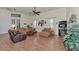 Bright living room featuring hardwood floors and ample seating at 8430 Acorn Blvd, Punta Gorda, FL 33982