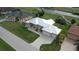 Single-Gathering home with metal roof, two car garage, and nicely landscaped yard at 2325 Padre Island Dr, Punta Gorda, FL 33950