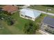 House with metal roof, screened porch, and spacious backyard at 2325 Padre Island Dr, Punta Gorda, FL 33950