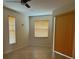 Spacious bedroom with neutral walls and tile flooring at 2325 Padre Island Dr, Punta Gorda, FL 33950