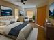 Main bedroom with neutral decor and ensuite bathroom at 2325 Padre Island Dr, Punta Gorda, FL 33950