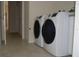 Laundry room with washer and dryer included at 2325 Padre Island Dr, Punta Gorda, FL 33950