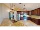 Updated kitchen with granite counters and stainless steel appliances at 27200 San Marino Dr, Punta Gorda, FL 33983