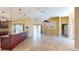 Gathering room with tile floors and access to the kitchen and pool at 27200 San Marino Dr, Punta Gorda, FL 33983