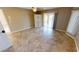 Bedroom with tile floors and access to the pool at 27200 San Marino Dr, Punta Gorda, FL 33983