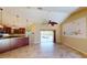 Bright Gathering room with pool view, tile floors, and ceiling fan at 27200 San Marino Dr, Punta Gorda, FL 33983