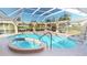 Enclosed pool and spa with covered lanai at 27200 San Marino Dr, Punta Gorda, FL 33983