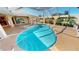 Enclosed heated pool and spa with canal view at 27200 San Marino Dr, Punta Gorda, FL 33983