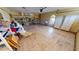 Spacious garage with ample storage shelving and cabinets at 27200 San Marino Dr, Punta Gorda, FL 33983
