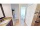 Main bathroom with toilet, shower, and vanity at 27200 San Marino Dr, Punta Gorda, FL 33983