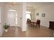 Light and airy entryway with wood-look flooring at 26332 Barranquilla Ave, Punta Gorda, FL 33983