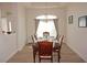 Formal dining room with wood table and chairs at 26332 Barranquilla Ave, Punta Gorda, FL 33983