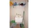 Laundry room with utility sink and built in shelving at 26332 Barranquilla Ave, Punta Gorda, FL 33983