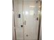 Modern shower with glass enclosure and built-in seat at 26332 Barranquilla Ave, Punta Gorda, FL 33983
