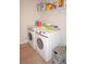 Laundry room with Samsung washer and dryer and built in shelving at 26332 Barranquilla Ave, Punta Gorda, FL 33983