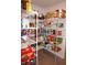 Well-stocked pantry with ample shelving at 26332 Barranquilla Ave, Punta Gorda, FL 33983