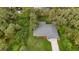 Aerial view of the house and surrounding landscape at 4347 Randypaar St, Port Charlotte, FL 33948