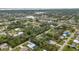 Aerial view of the house, highlighting its location in a residential neighborhood with water access at 4347 Randypaar St, Port Charlotte, FL 33948