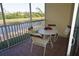 Relaxing screened balcony overlooking a pond at 175 Kings Hwy # 923, Punta Gorda, FL 33983