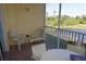 Spacious screened balcony with outdoor seating at 175 Kings Hwy # 923, Punta Gorda, FL 33983