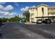Yellow two-story building with covered parking at 175 Kings Hwy # 923, Punta Gorda, FL 33983