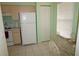 Bright kitchen nook with a small table and chairs, ideal for casual dining at 175 Kings Hwy # 923, Punta Gorda, FL 33983