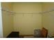 Large walk-in closet with wire shelving and ample storage space at 175 Kings Hwy # 923, Punta Gorda, FL 33983