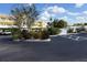 Two-story building with covered parking and landscaping at 175 Kings Hwy # 923, Punta Gorda, FL 33983