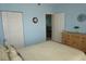 Bedroom with light-blue walls and double bed at 175 Kings Hwy # 923, Punta Gorda, FL 33983