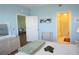 Spacious bedroom with ensuite bathroom and access to another room at 175 Kings Hwy # 923, Punta Gorda, FL 33983